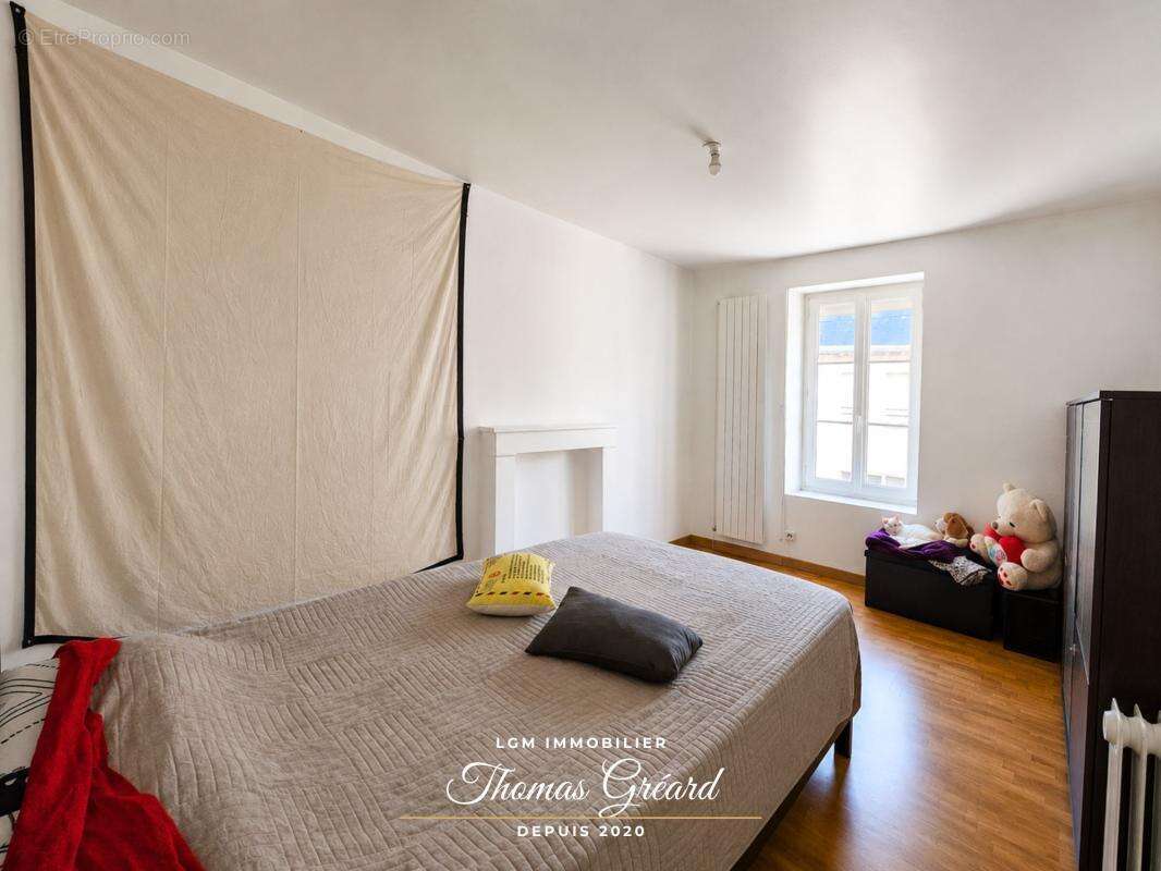  Immeuble mixte avec murs commerciaux, appartement, annexe et grange – Rentabilité nette de 8,2 % - photo 8
