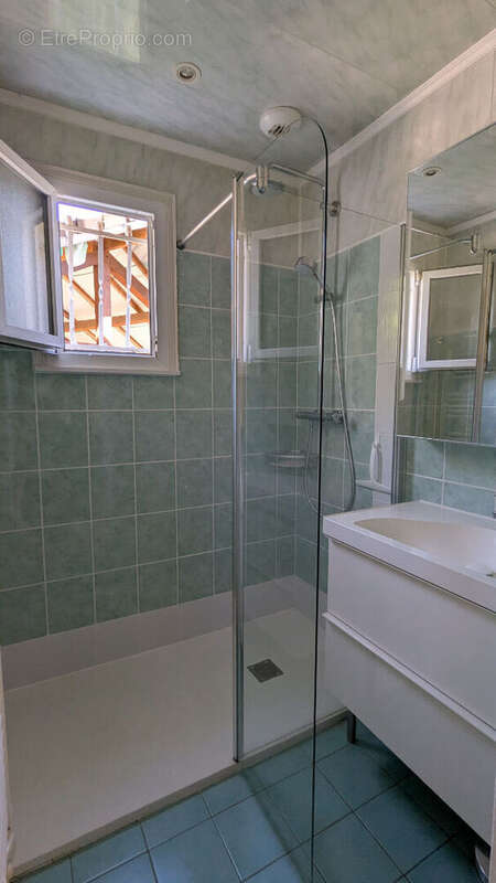 Maison de plain-pied 128 m² avec jardin à Val-de-Reuil 4 chambres - photo 10