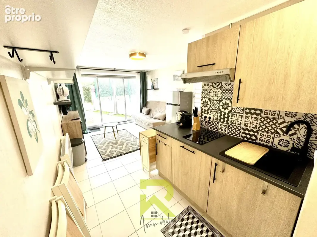 T2 en rez de jardin avec parking privé - photo 4