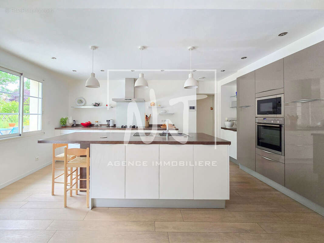 Maison familiale à vendre à Savennières avec atelier / garage aux portes d'Angers - photo 4