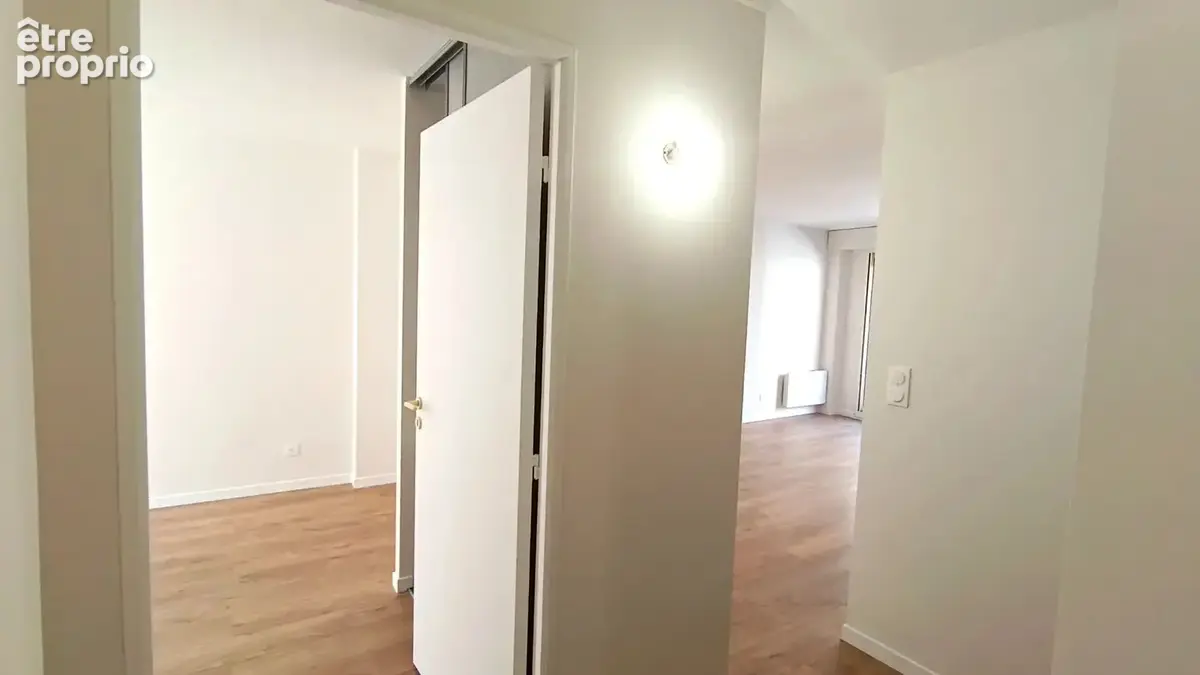 3 Pièces 53m² avec balcon et parking sous-sol. - photo 8