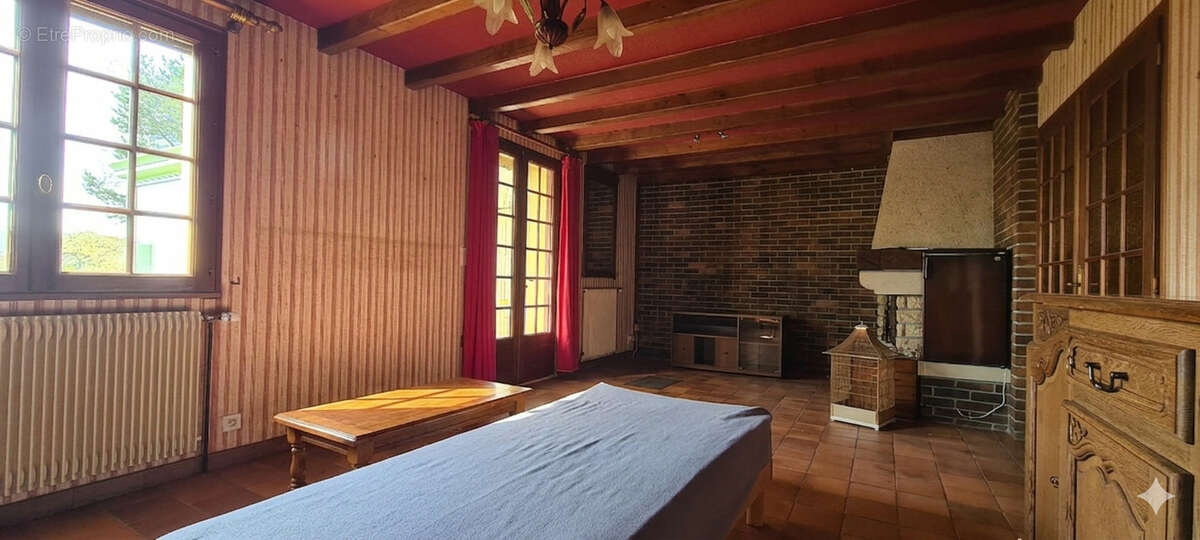 Maison à MOGNEVILLE