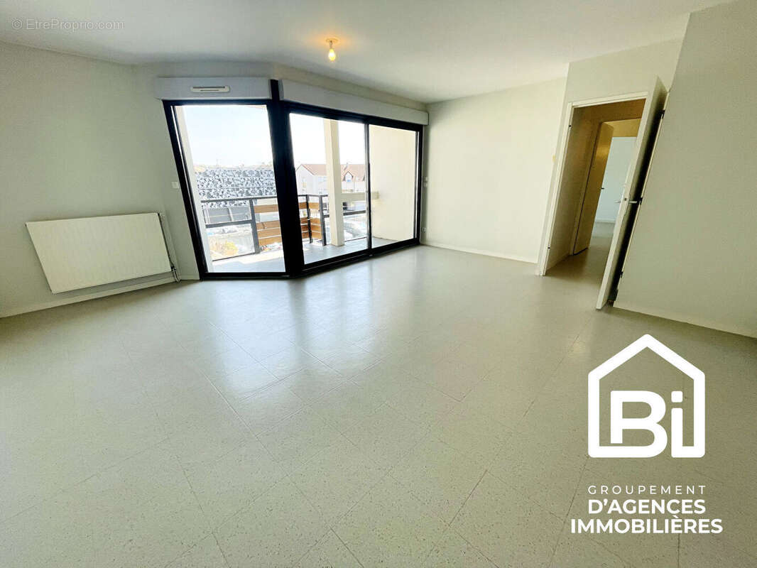 DOUVRES LA DÉLIVRANDE - T3 lumineux avec balcon, cave et double parking - photo 2