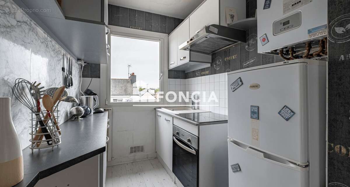 Appartement T2 plein sud avec cave et place de parking sécurisée - photo 5