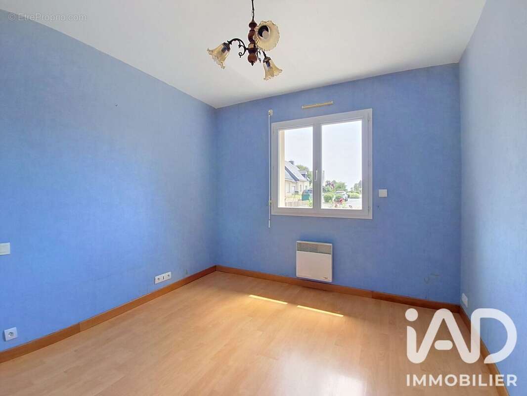 Maison 94 m² à Irodouer  - photo 6