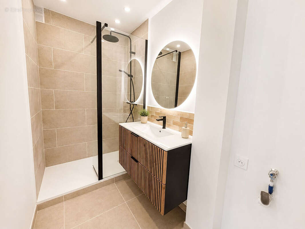 appartement 3 pièces dans une copropriété au pied de la gare d'Enghien-les-Bains - photo 4
