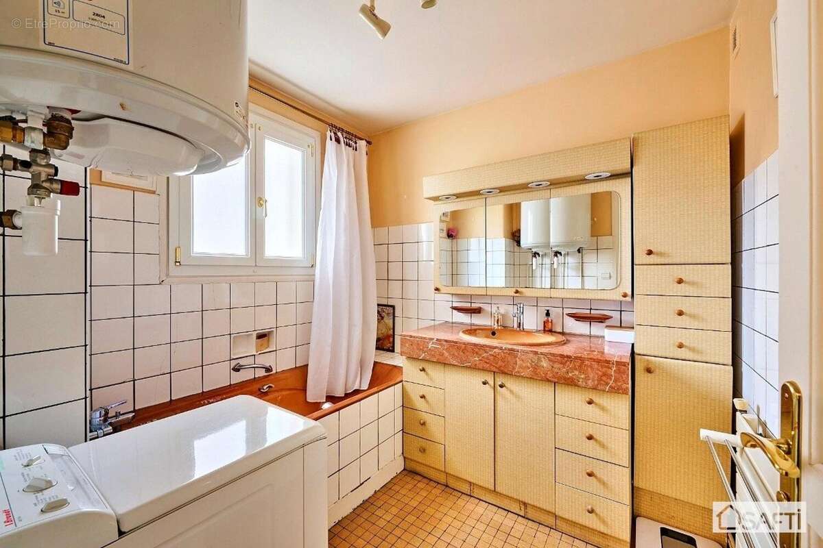 Photo 7 - Appartement à COURBEVOIE