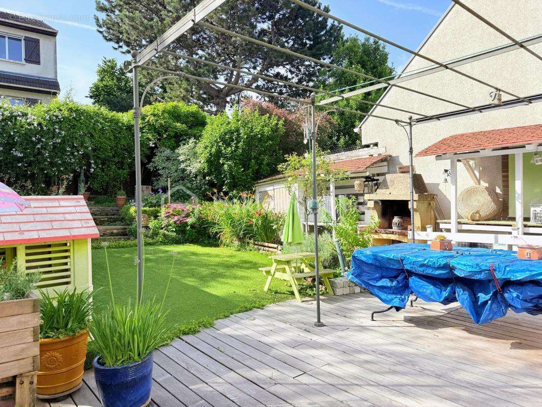 Maison spacieuse avec terrasse et jardin dans un cadre serein - photo 20