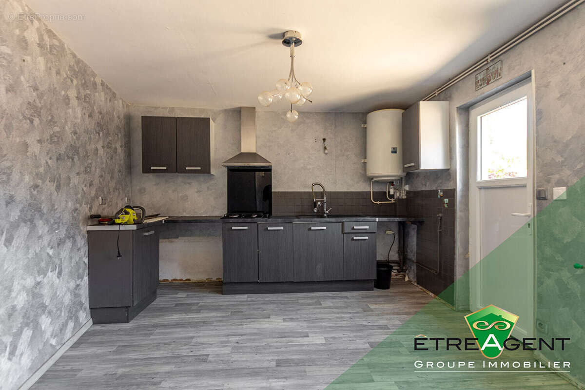Maison DAMVILLE CENTRE-VILLE - 142 m² - 3 chambres - photo 15