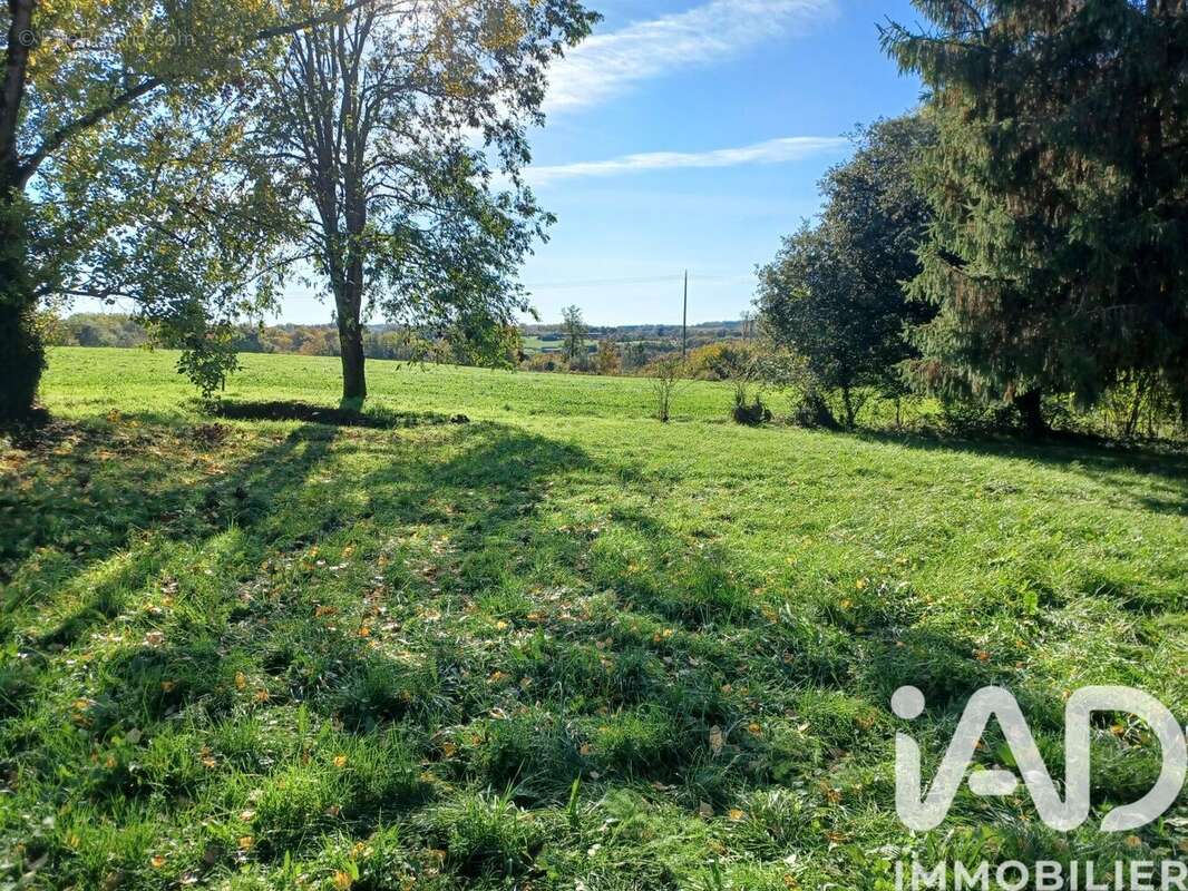 Photo 2 - Maison à ARCHIGNAC