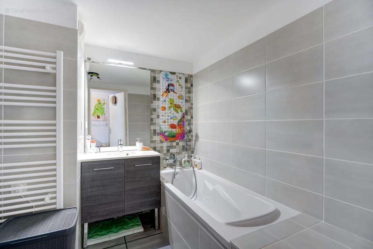 Appartement T4 de 90 m² à Villeurbanne - photo 12