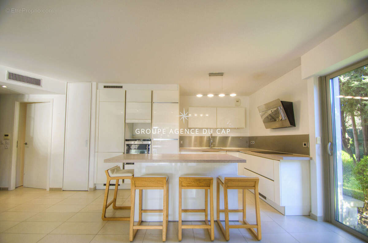 Appartement en rez de jardin dans residence - photo 3