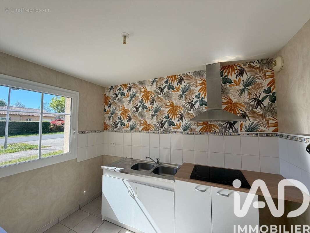 Photo 2 - Maison à FONTAINE-LE-COMTE