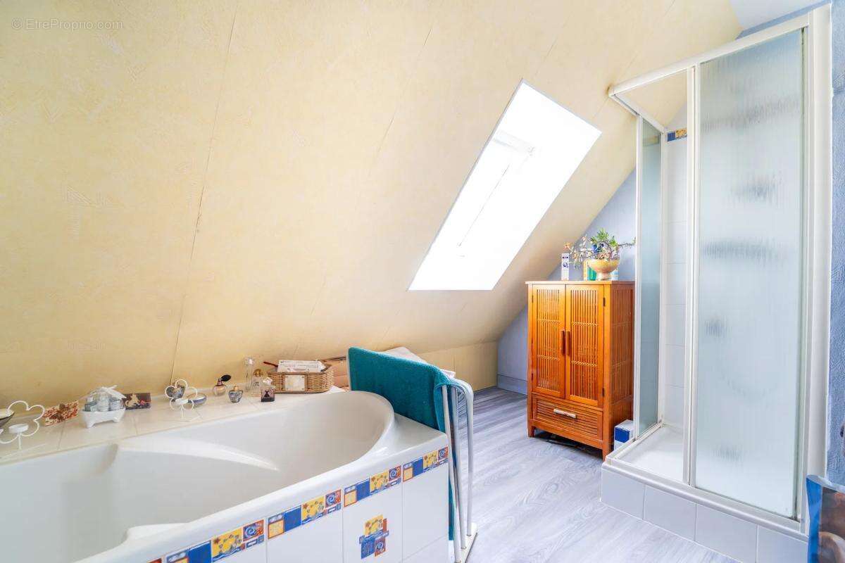 Maison de 5 pièces de 108 m² à Amfreville-sur-Iton - photo 18