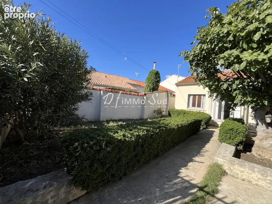 Maison de ville 3 faces avec jardin- 2 chambres- emplacement rare quartier lacroix/cassayet - photo 2