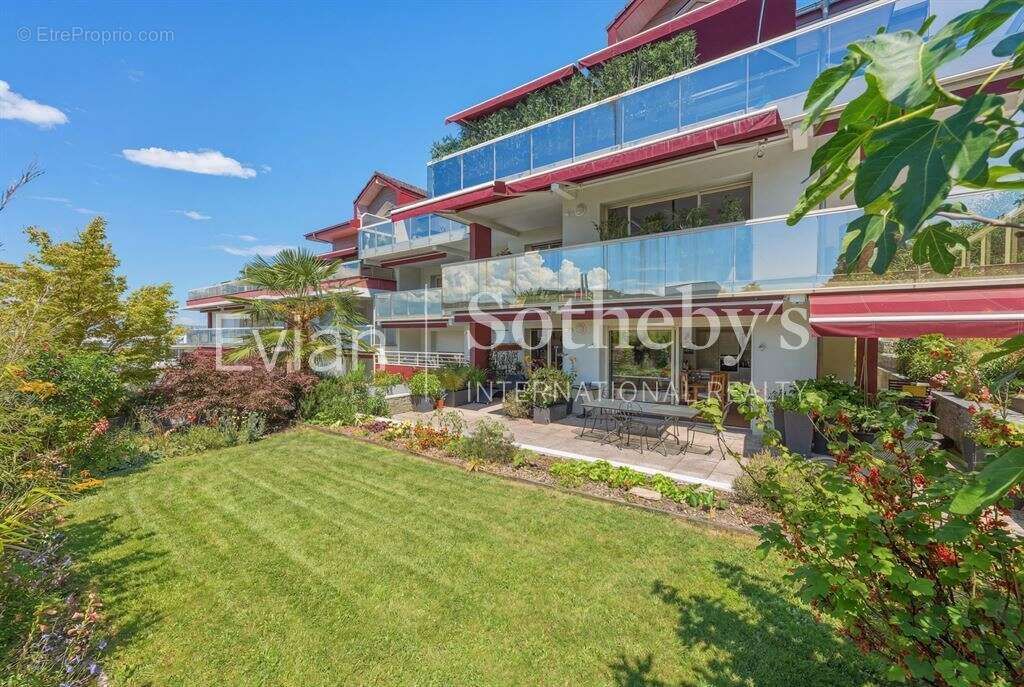 Rare, Evian, T4 en rez de jardin surélevé de 113 m2 avec vue lac et terrasse de 82 m2. - photo 3