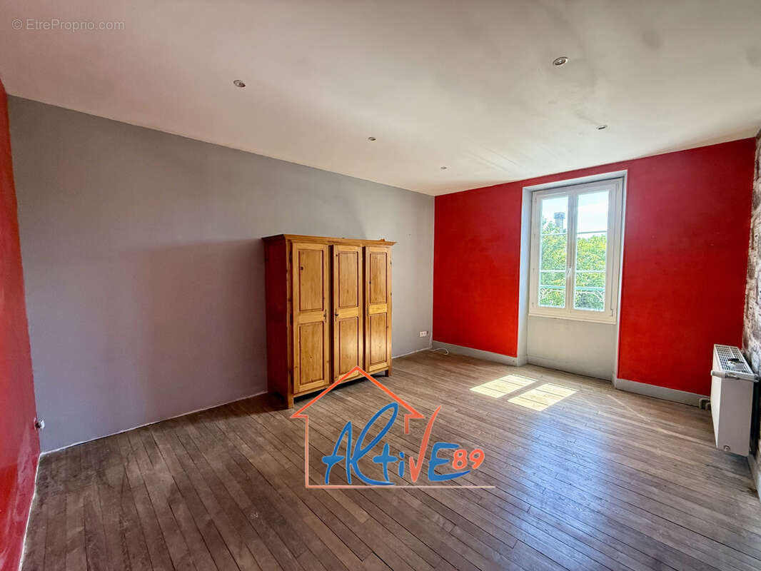Maison familiale de 187m2 avec 4 chambres et fort potentiel à Bonnard - photo 11