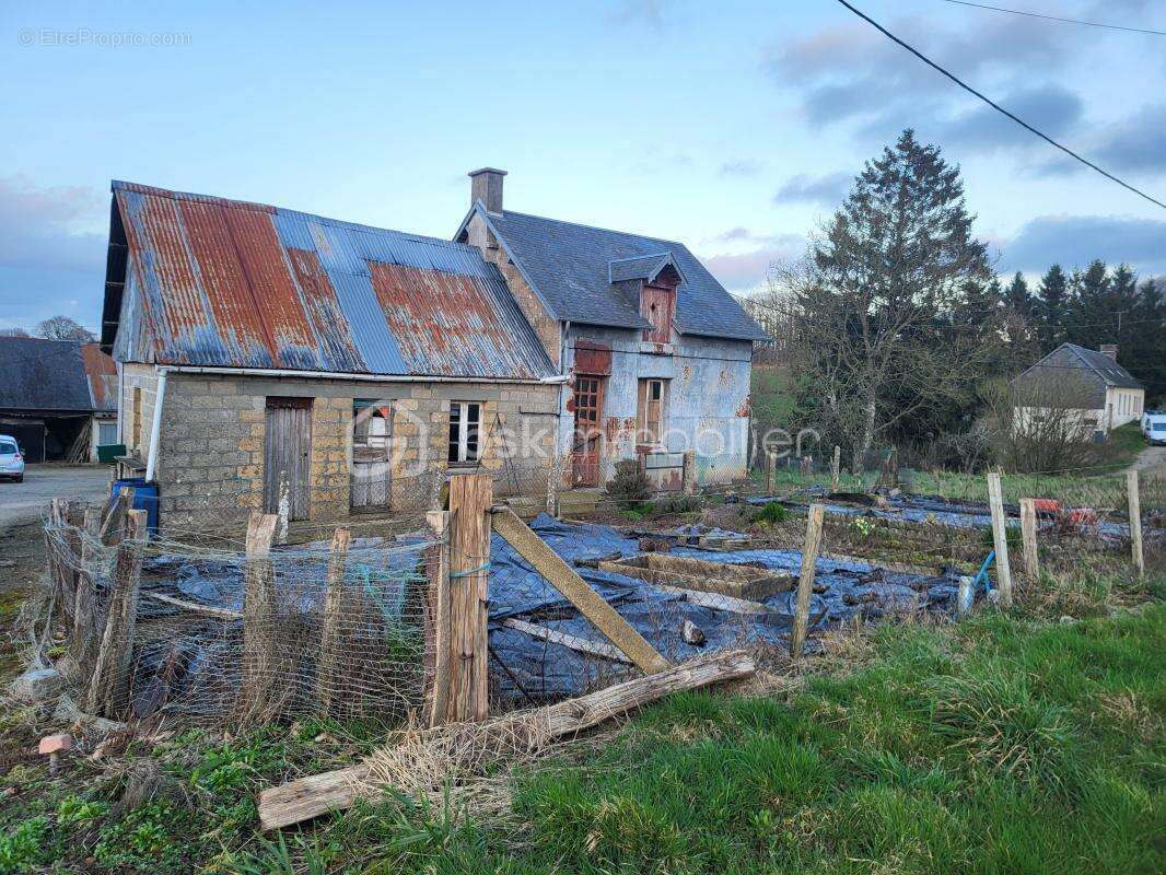 Maison à JUVIGNY-LE-TERTRE