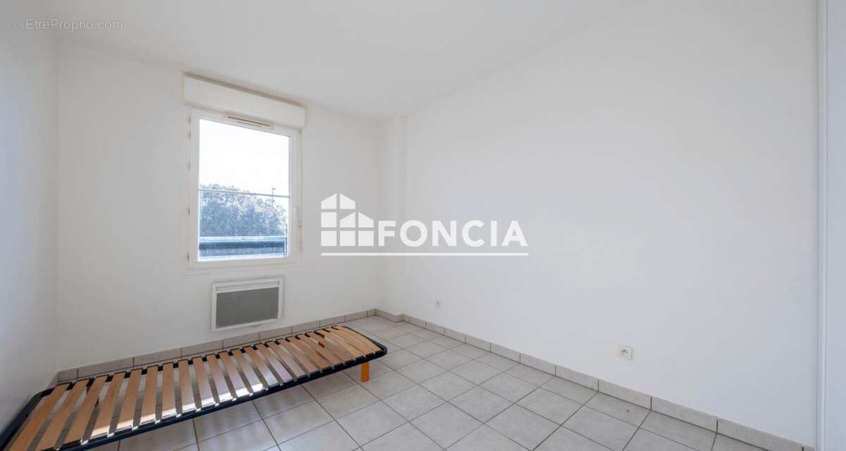 Appartement à FROUZINS