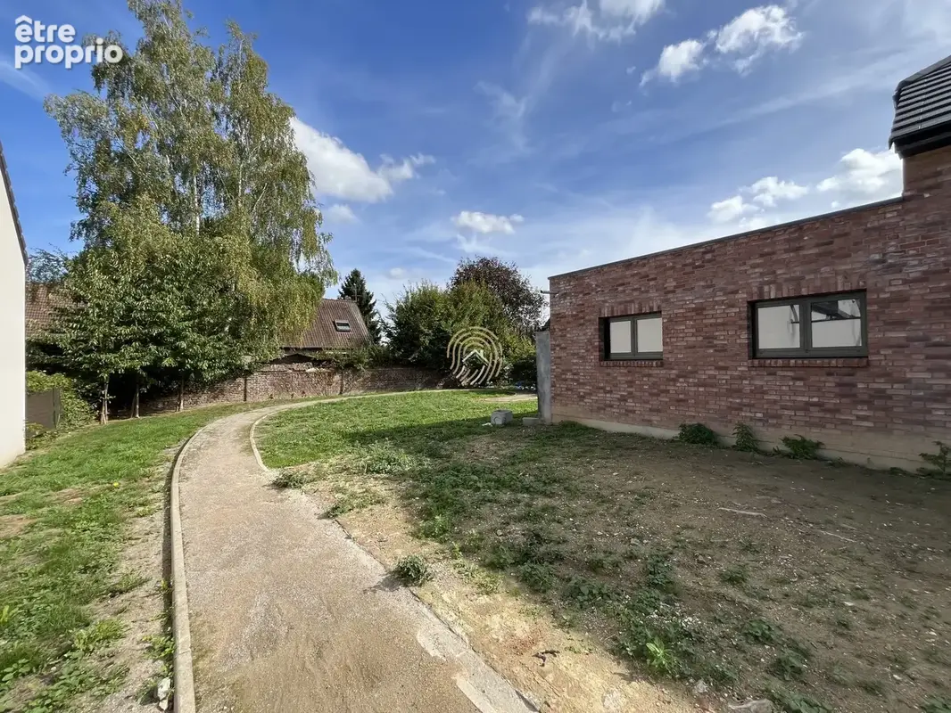 Maison 6 pièces 155 m² à vendre à Cuincy (59553) - photo 3