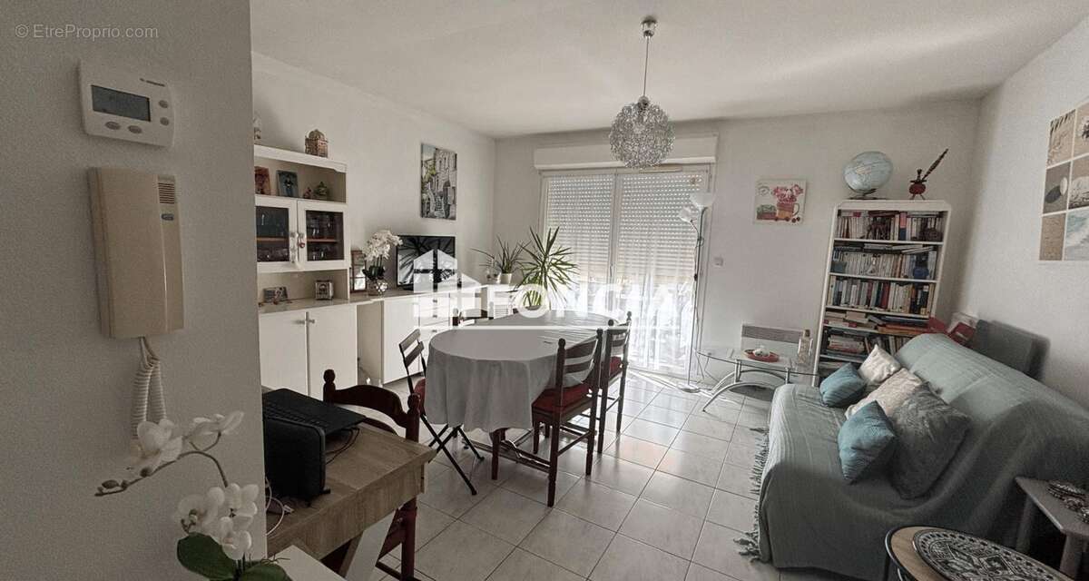 Appartement T2 - loué - résidence Jonzac - photo 3