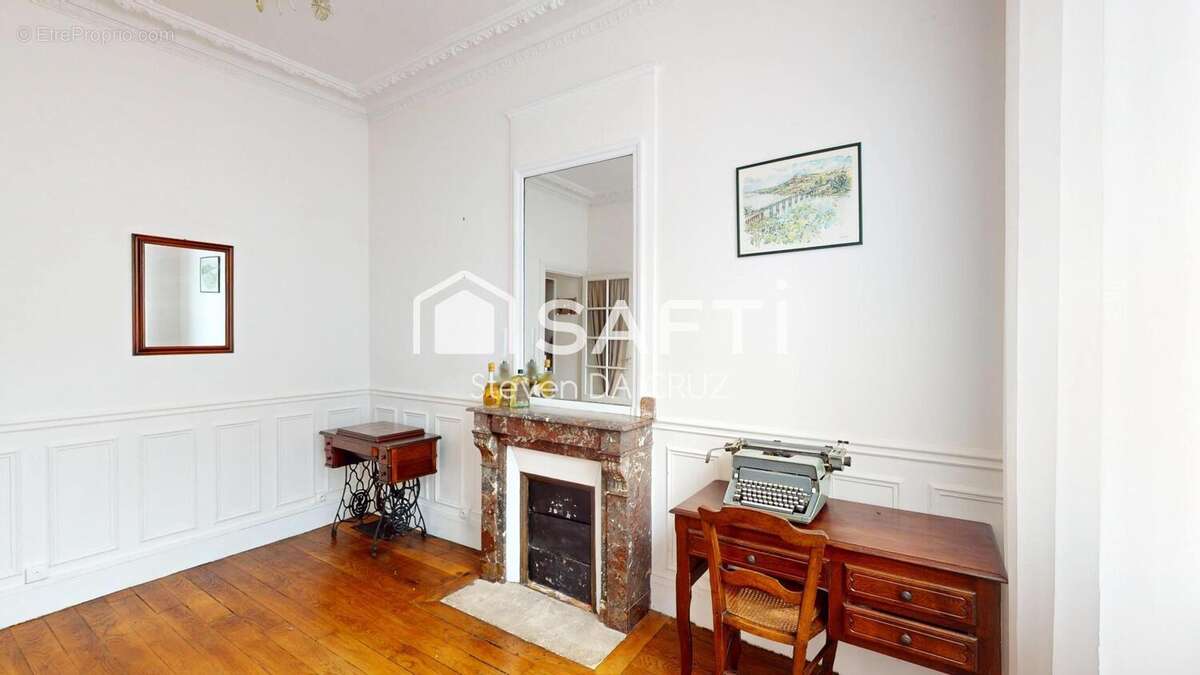 Photo 2 - Appartement à COURBEVOIE