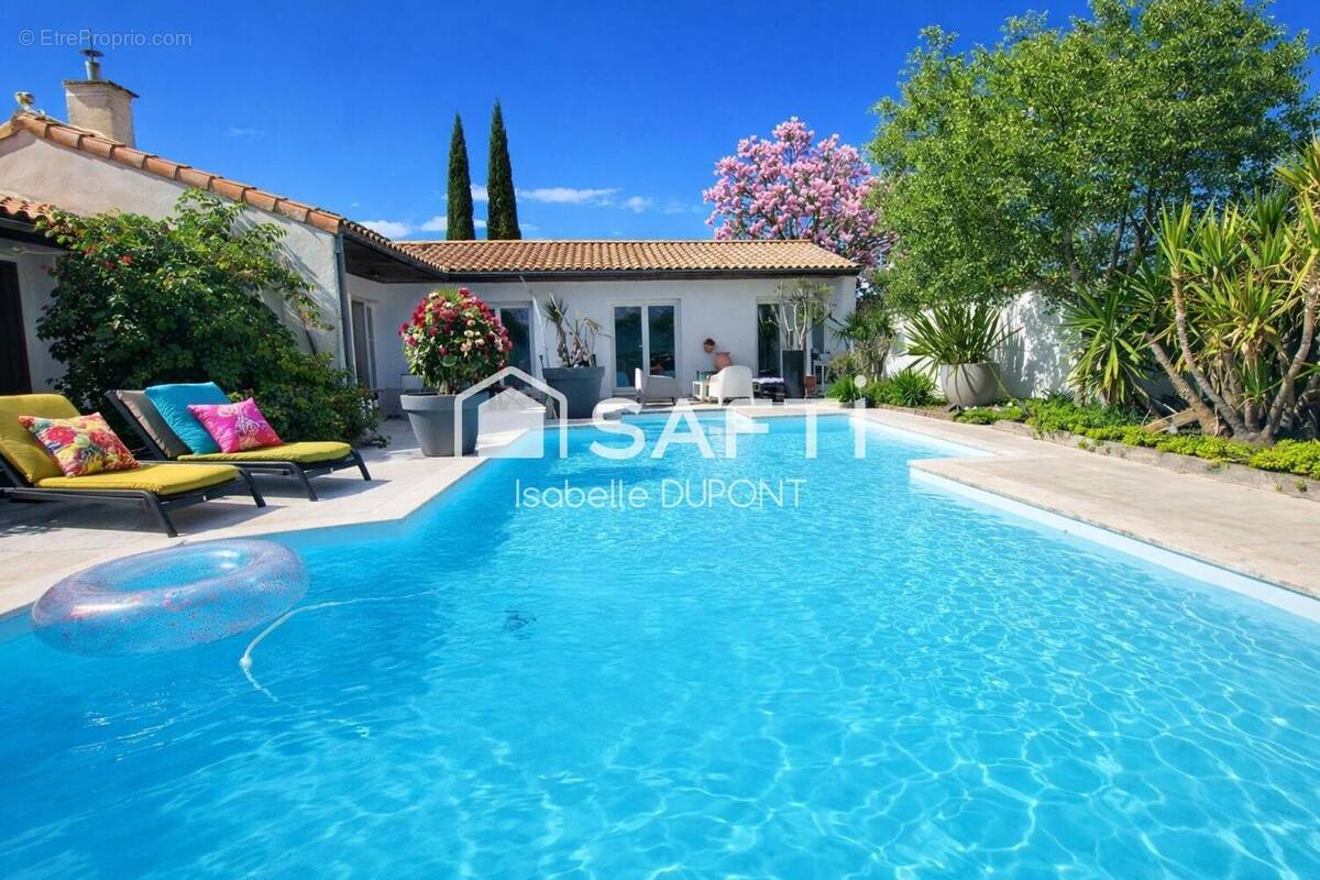 Photo 1 - Maison à LE HAILLAN