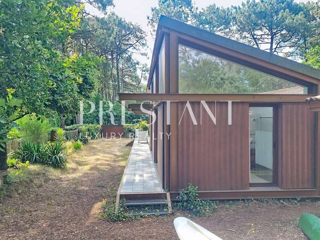 Villa d'architecte unique en première ligne face au lac de Lacanau - photo 6