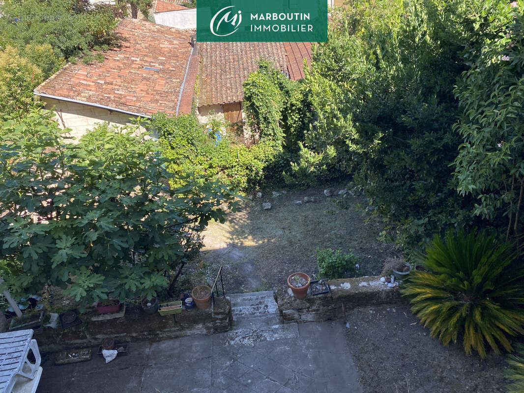 Maison de ville avec jardin et garage - photo 2