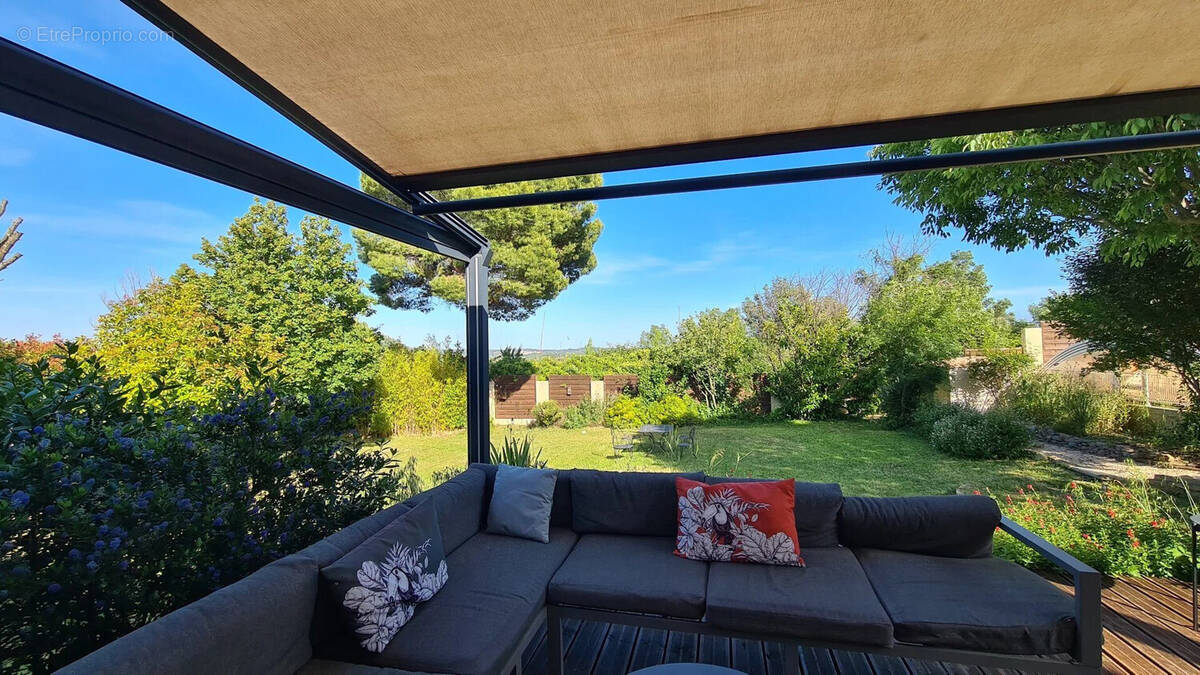 la terrasse couverte - Maison à TOURBES