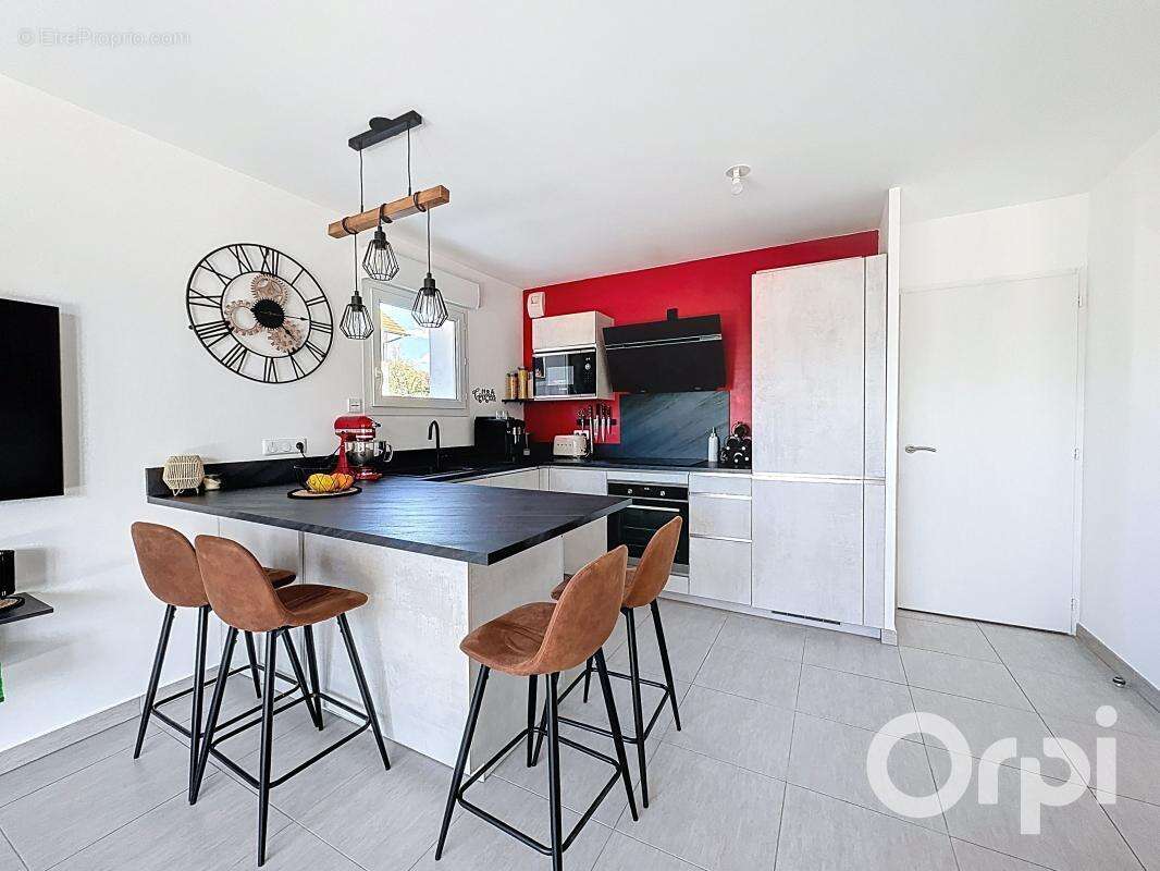 NANGY - Appartement rez-de-jardin - photo 3
