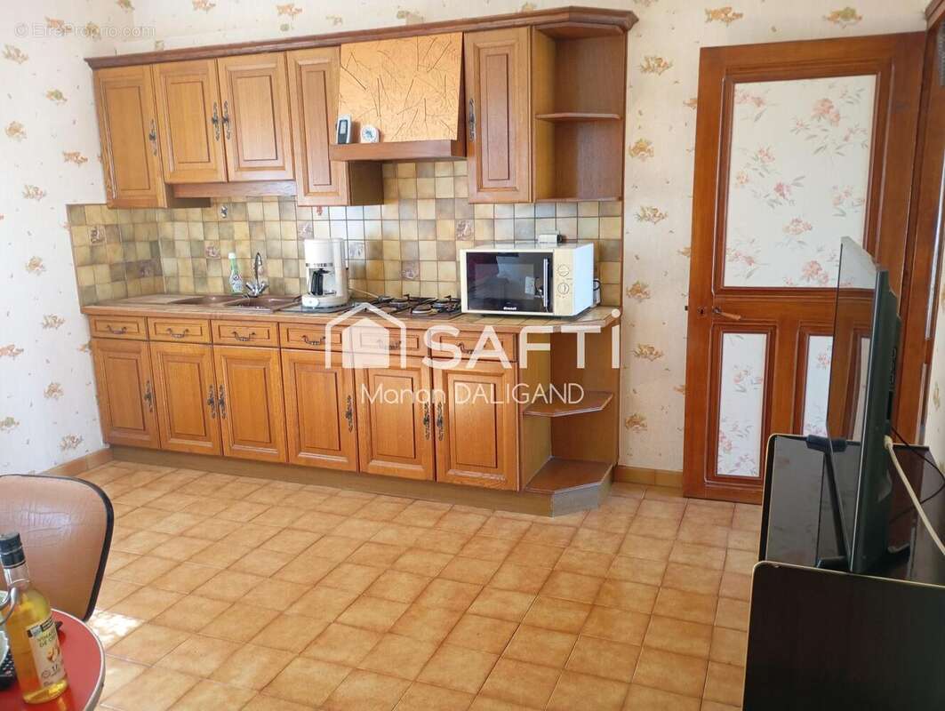 Photo 2 - Maison à GUEUGNON