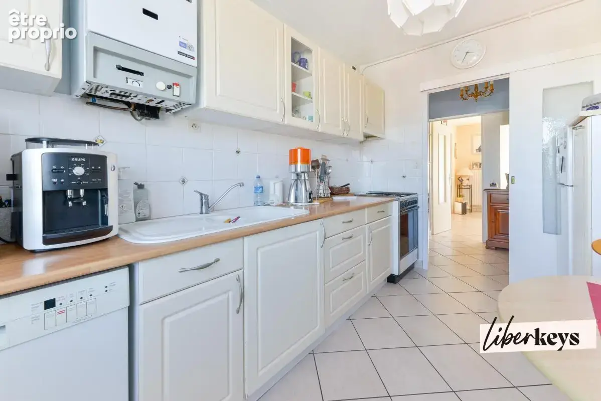 Appartement T4 de 77 m² avec balcon, cave et parking équipé - photo 10