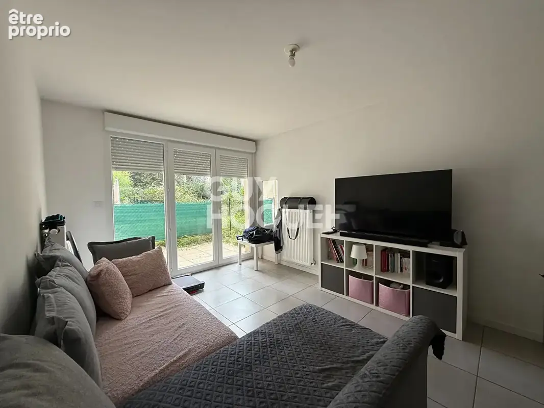 Appartement Givors 2 pieces de 41.88 m2+parking+rez de jardin VENDU LOUE - photo 3