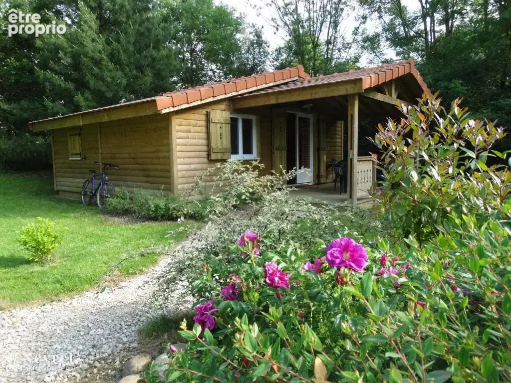 Propriété composée de cinq chalets et deux étangs - photo 8