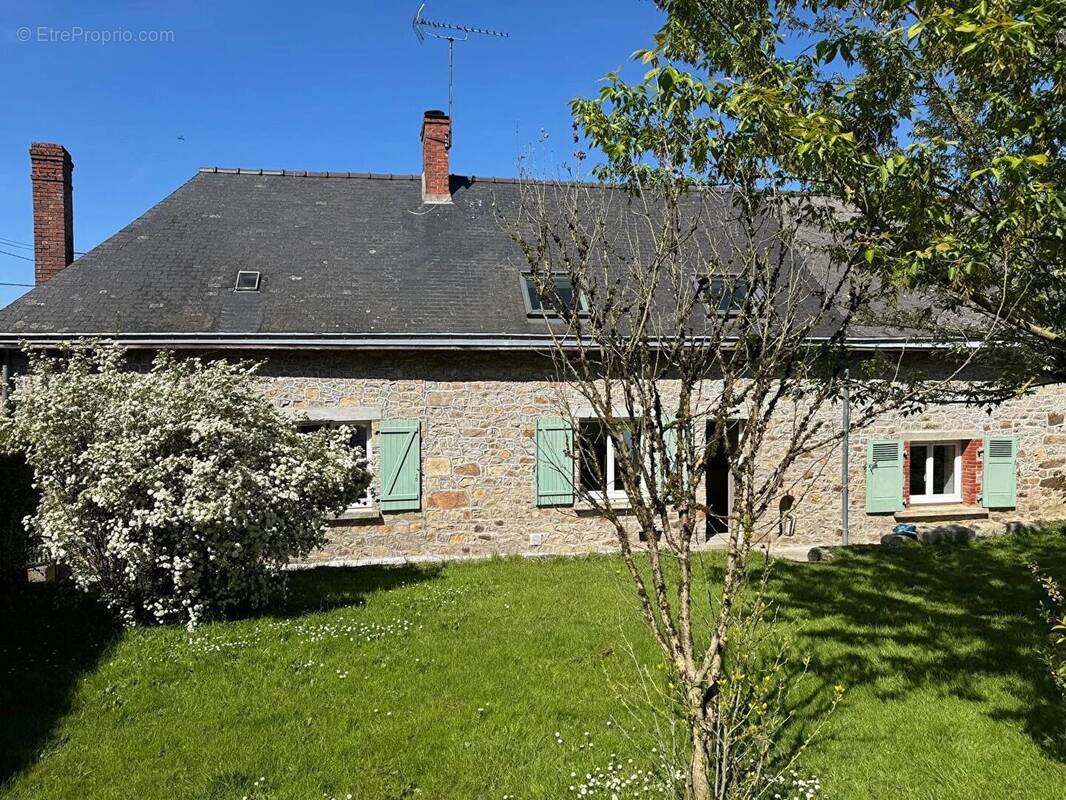 Maison à JUVIGNE
