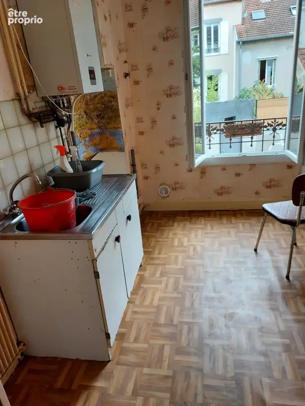 Appartement à rénover VICHY proche centre-ville - photo 4