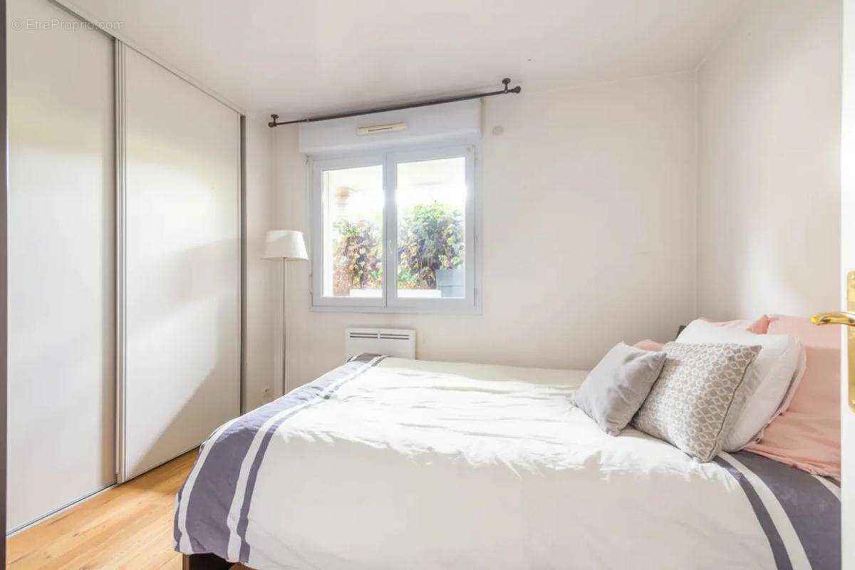Suresnes - 49m² - appartement T2 - Terrasse / jardin - parking - cave - photo 6