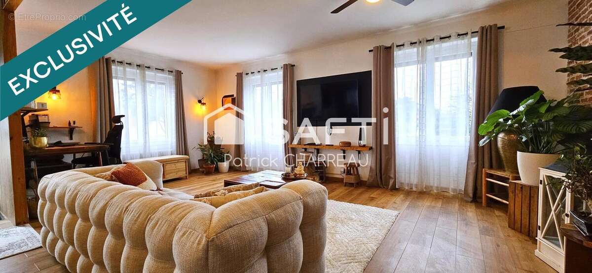 Photo 2 - Maison à TERRASSON-LAVILLEDIEU