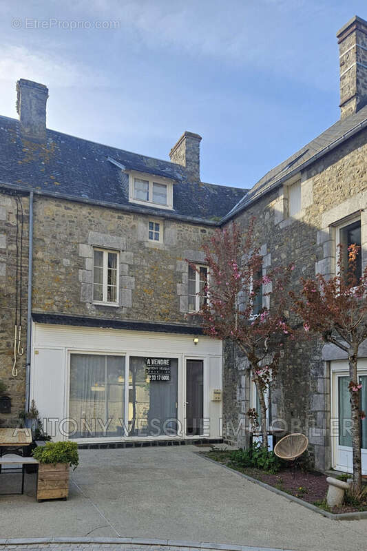 Maison à AGON-COUTAINVILLE