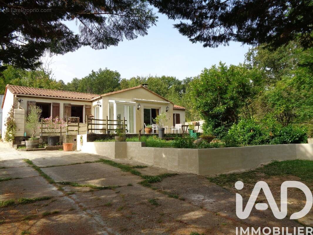 Photo 1 - Maison à LA CHAPELLE-DES-POTS