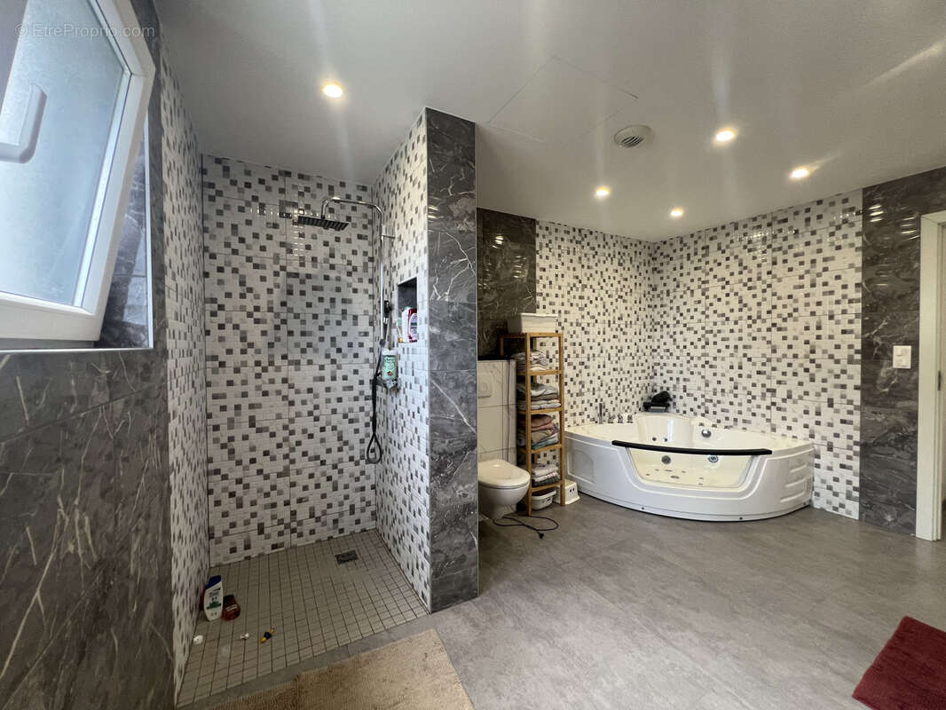 A Bischwihr, une superbe maison individuelle à toit plat 5 pièces de 125 m2 de 2020 de surface habitable sur u - photo 11