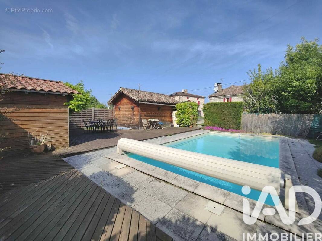 Photo 1 - Maison à SAINT-BEAUZILE