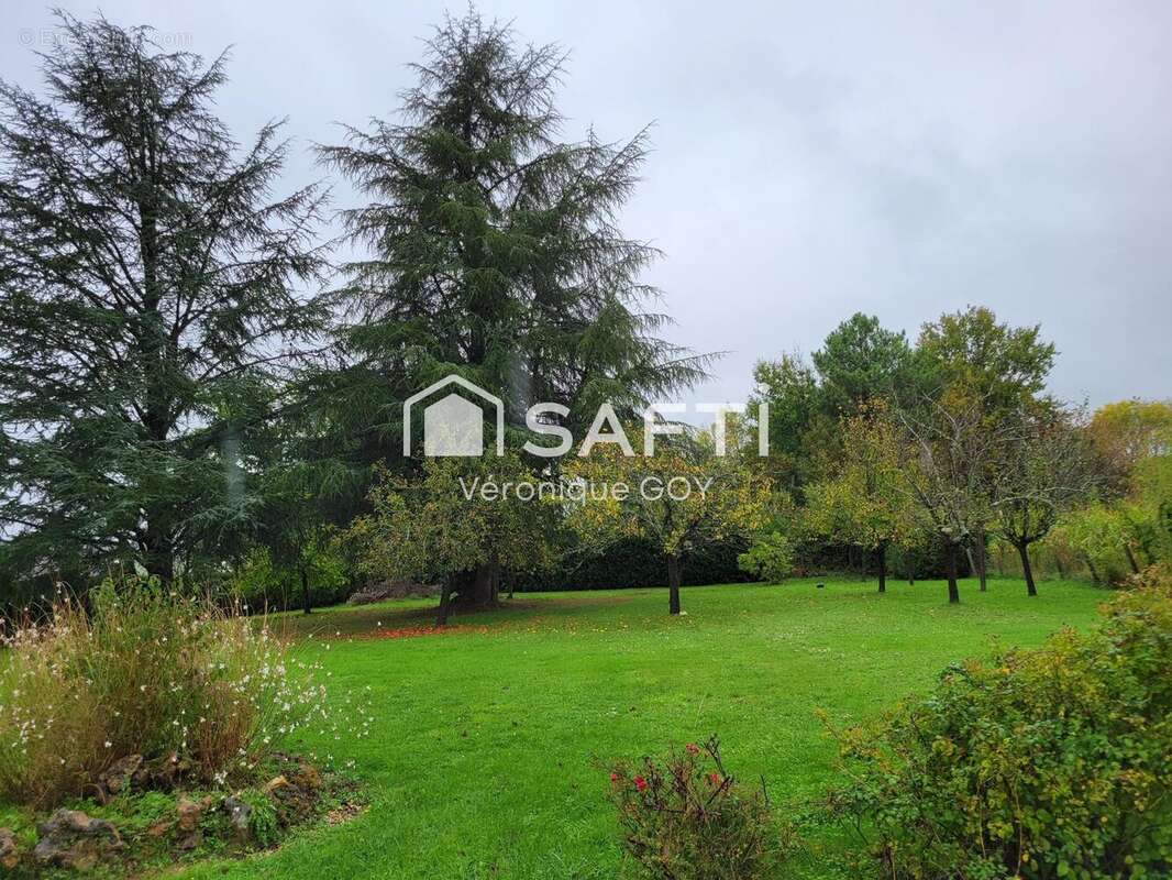 Photo 2 - Maison à SAINT-SULPICE-DE-ROUMAGNAC