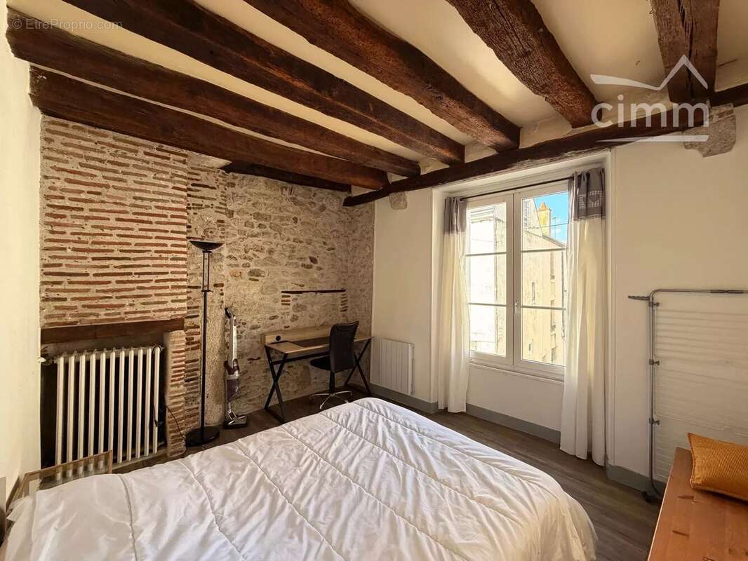 Immeuble de rapport avec local commercial loué et deux appartements - photo 8