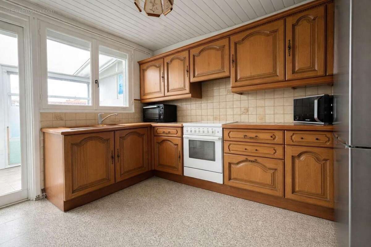 Photo 2 - Maison à FACHES-THUMESNIL