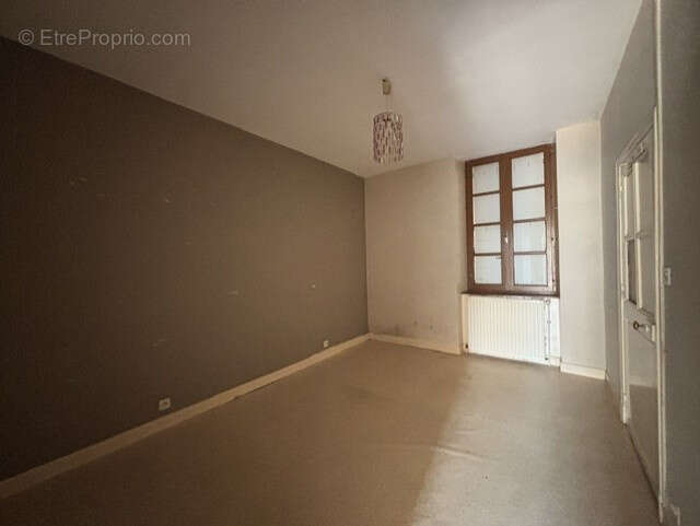 EXCLUSIVITE à AUTUN, T3 en RDC avec balcon et garage. - photo 7