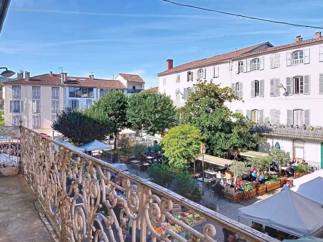 Appartement et local commercial - photo 3