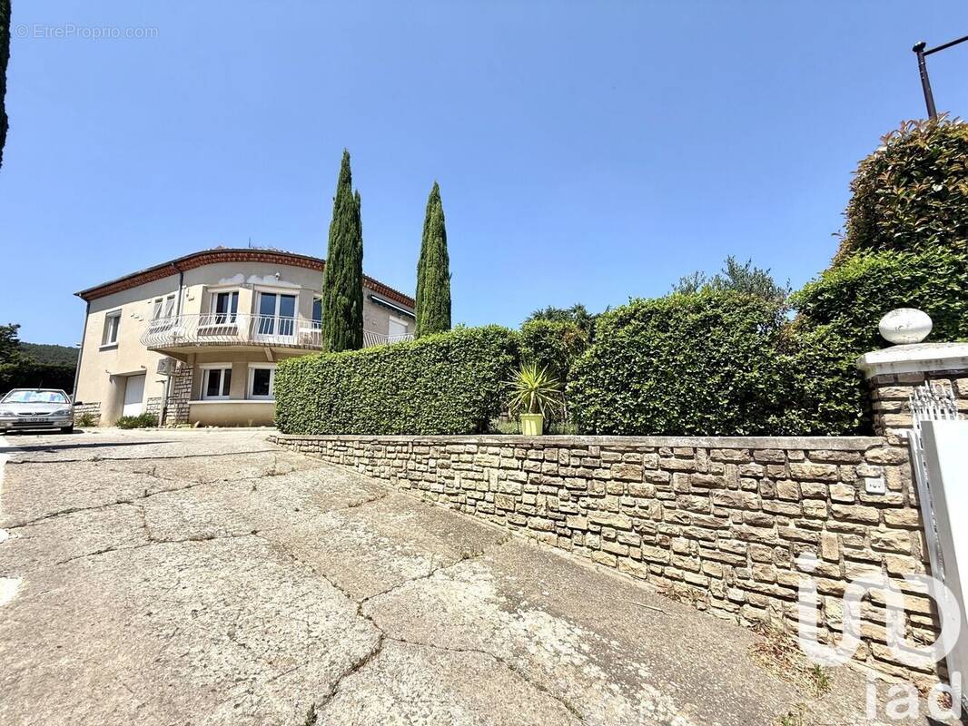 Photo 1 - Maison à LAUDUN-L'ARDOISE