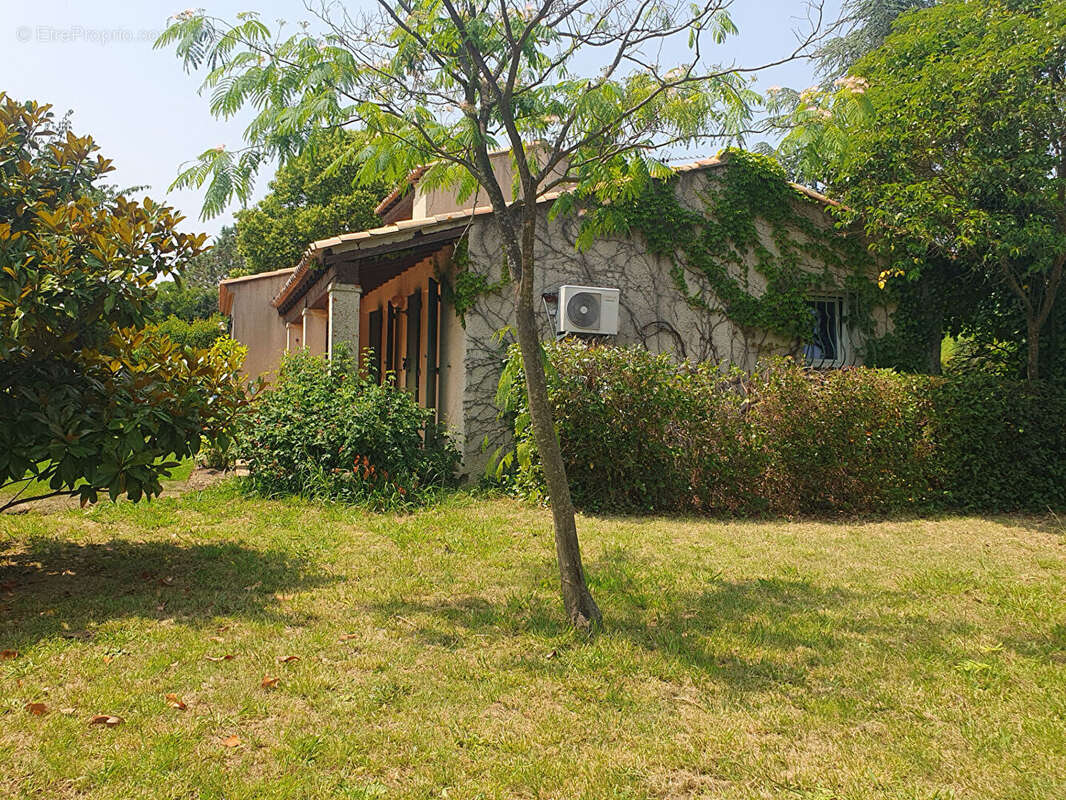 Calvisson  vente en viager, occupe 1 tete  villa 99m²  1990m² de jardin - photo 6